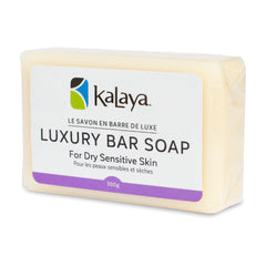 Diagonally front view of bar of Kalaya Luxury Bar Soap for Dry Sensitive Skin 100g, in purple